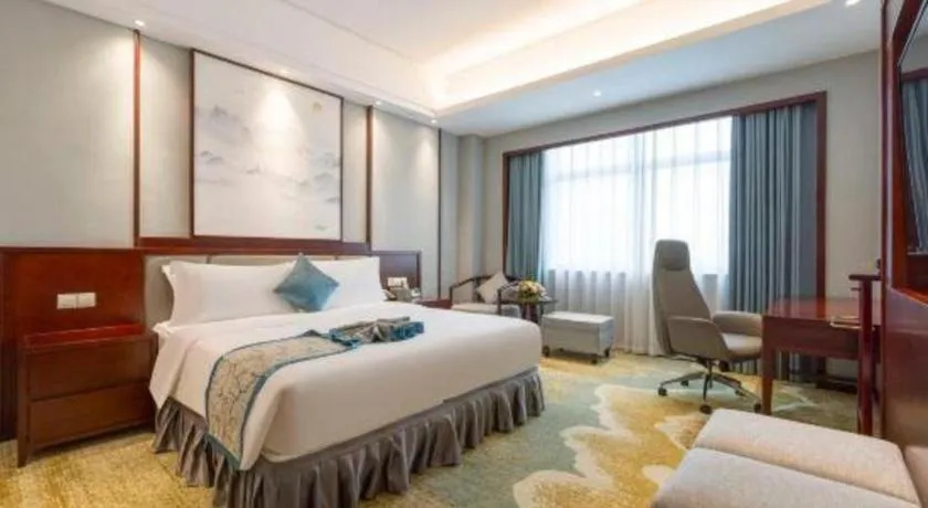Bed in Yiyang Huatian Hotel