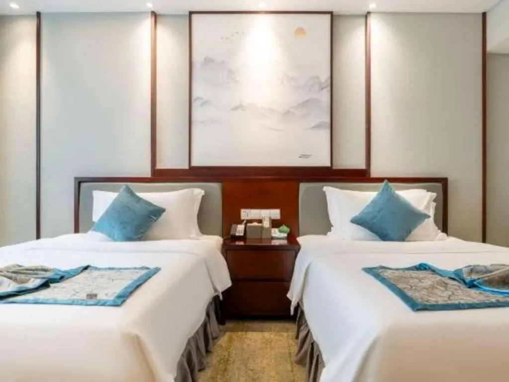 Bed in Yiyang Huatian Hotel