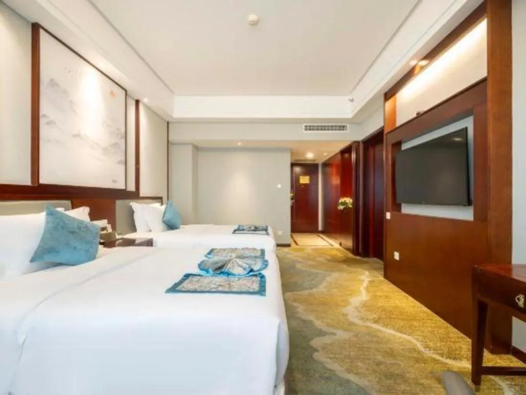 Bed in Yiyang Huatian Hotel