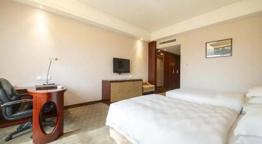 Bed in Yiyang Huatian Hotel