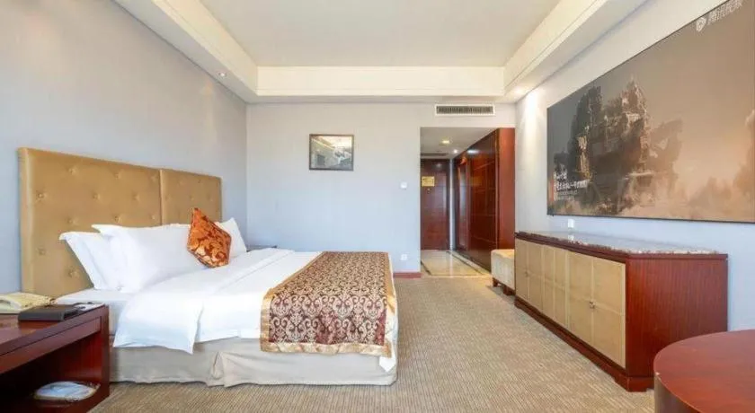 Bed in Yiyang Huatian Hotel