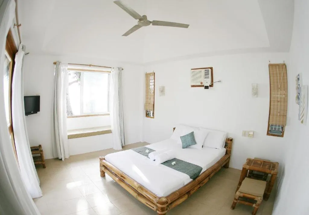 Bed in Elysia Beach Resort