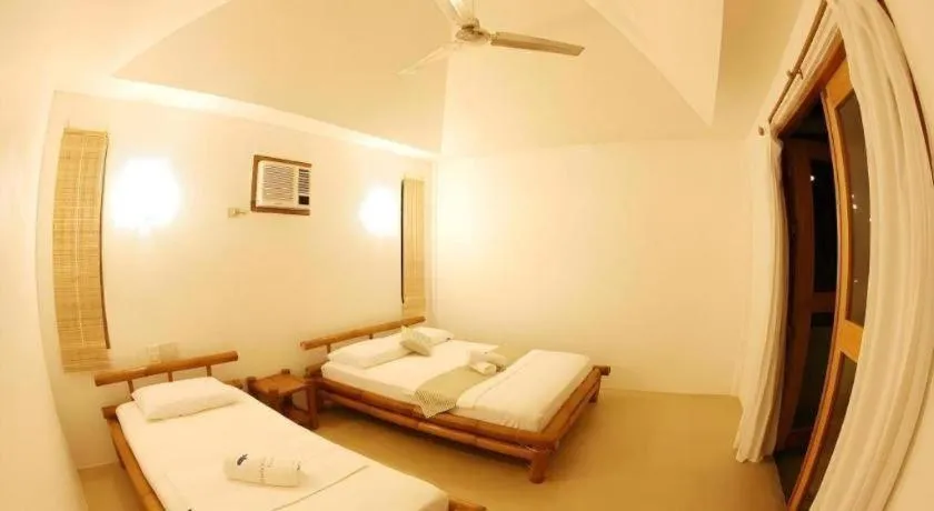 Bed in Elysia Beach Resort