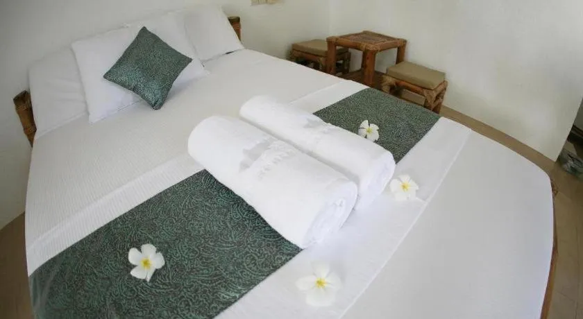 Bed in Elysia Beach Resort