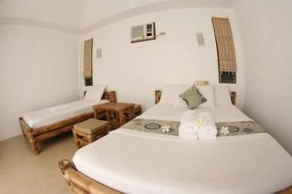 Bed in Elysia Beach Resort
