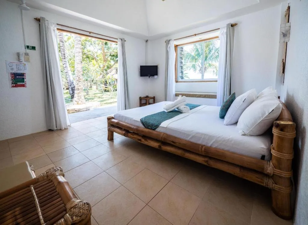 Bed in Elysia Beach Resort