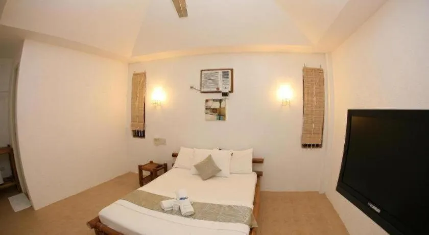 Bed in Elysia Beach Resort