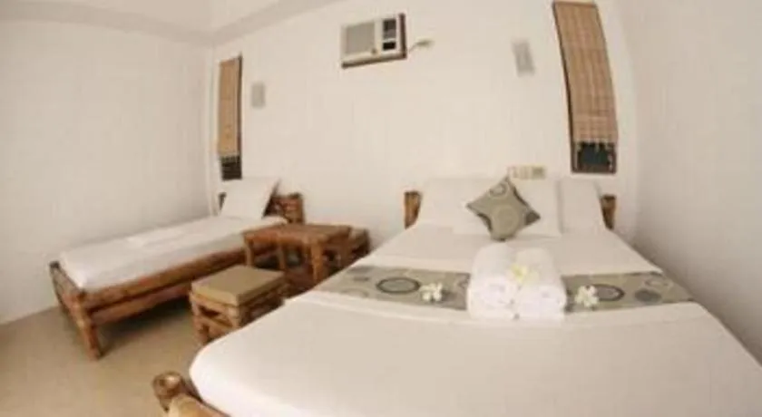 Bed in Elysia Beach Resort