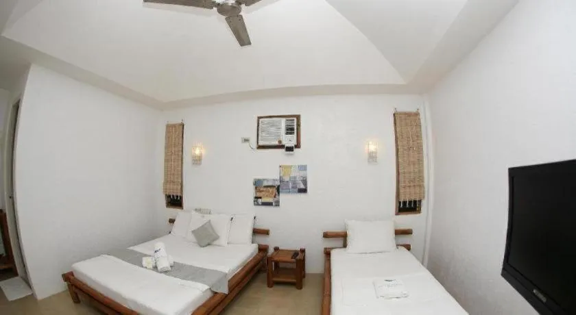 Bed in Elysia Beach Resort