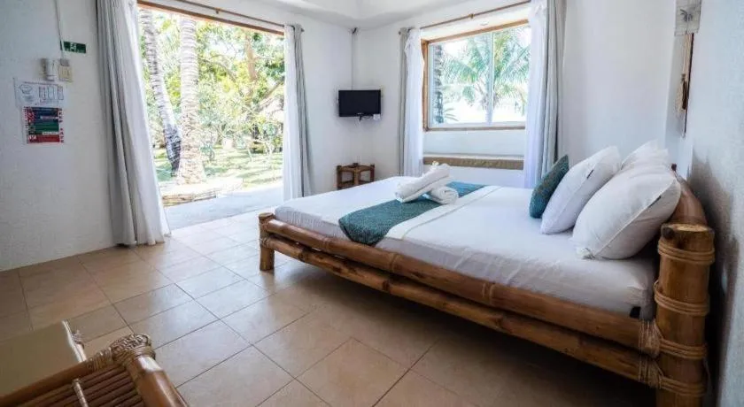 Bed in Elysia Beach Resort