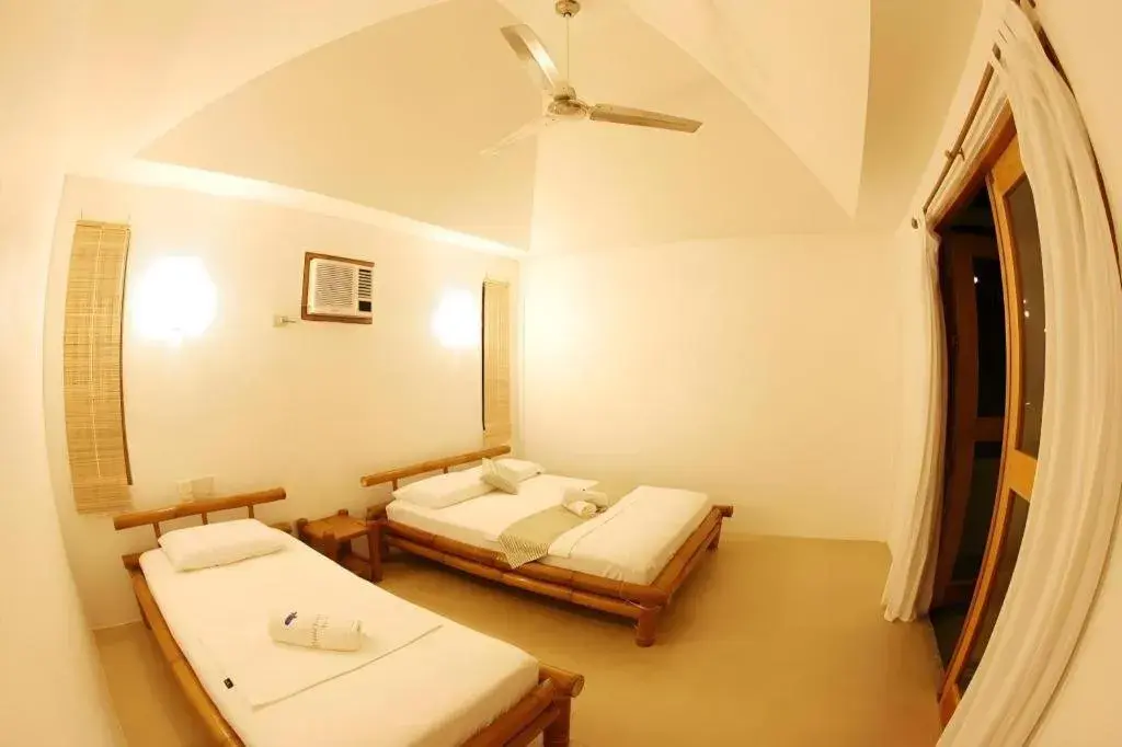 Bed in Elysia Beach Resort Bed in Elysia Beach Resort