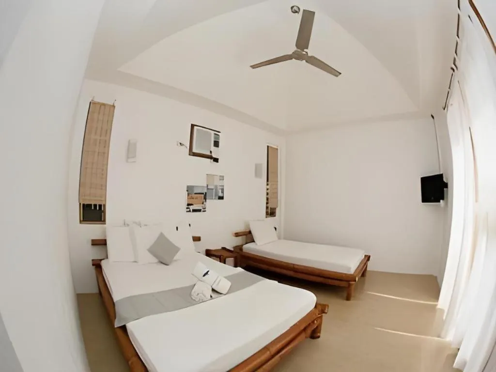 Bed in Elysia Beach Resort
