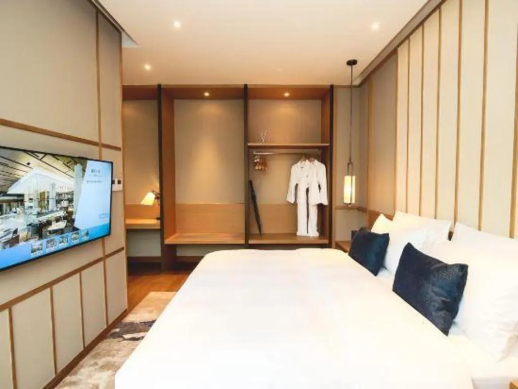 Bed in The Mulian Urban Resort Hotels Huadu