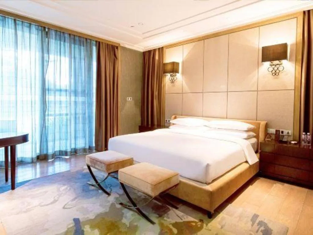 Bed in The Mulian Urban Resort Hotels Huadu