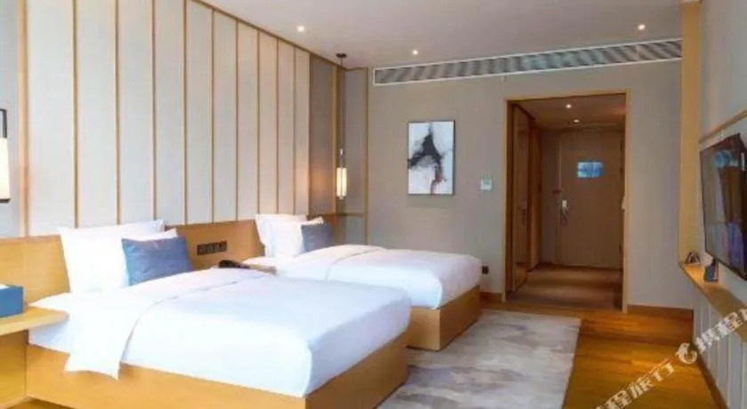 Bed in The Mulian Urban Resort Hotels Huadu