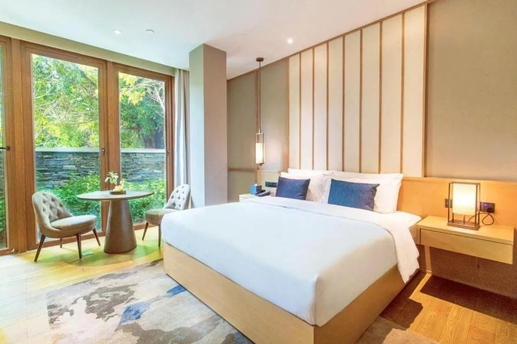 Bed in The Mulian Urban Resort Hotels Huadu