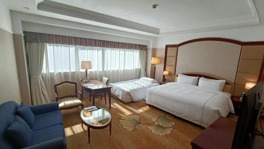 Bed in Jianguo Garden Hotel