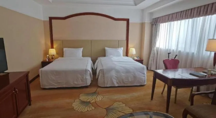Bed in Jianguo Garden Hotel
