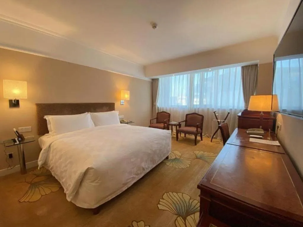 Bed in Jianguo Garden Hotel