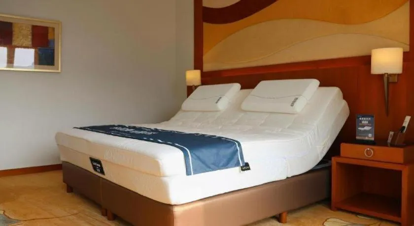 Bed in Jianguo Garden Hotel