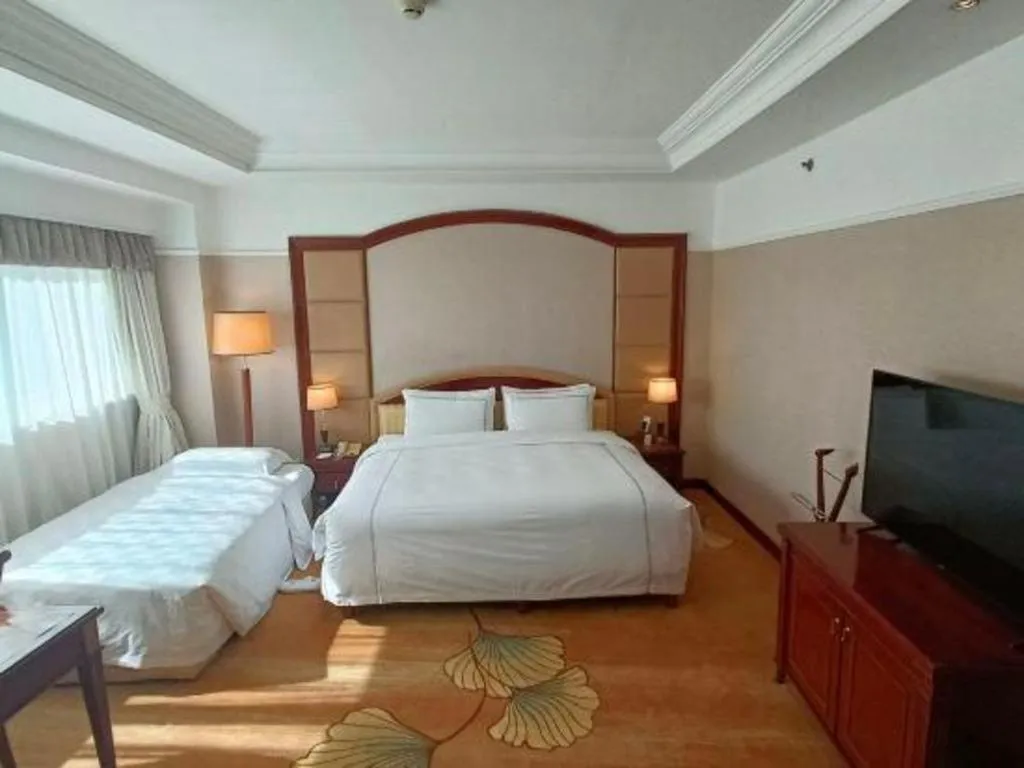 Bed in Jianguo Garden Hotel