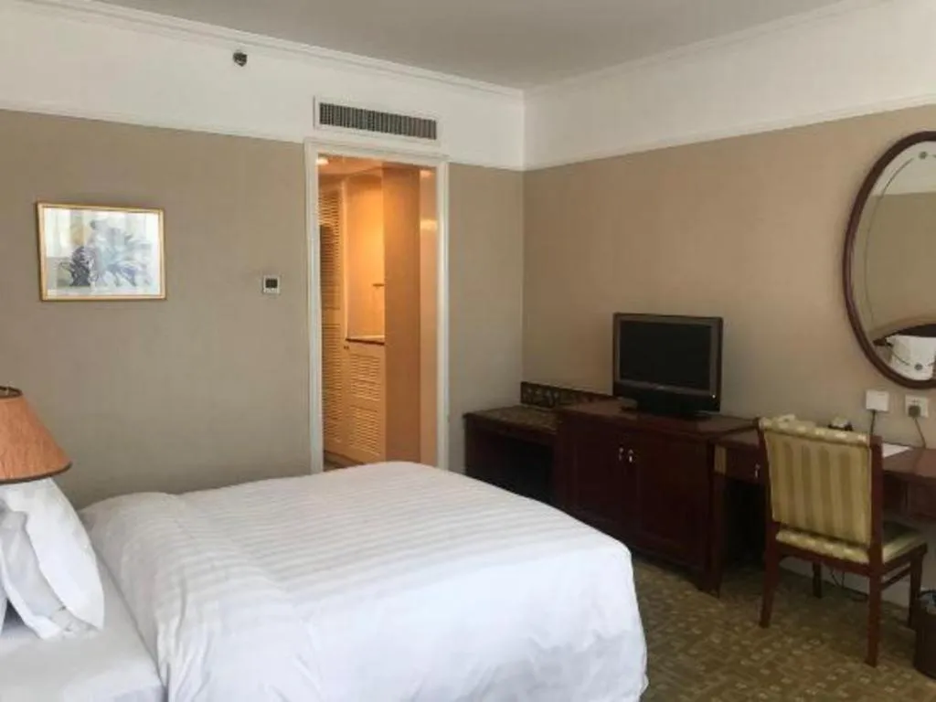 Bed in Jianguo Garden Hotel