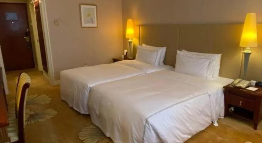 Bed in Jianguo Garden Hotel
