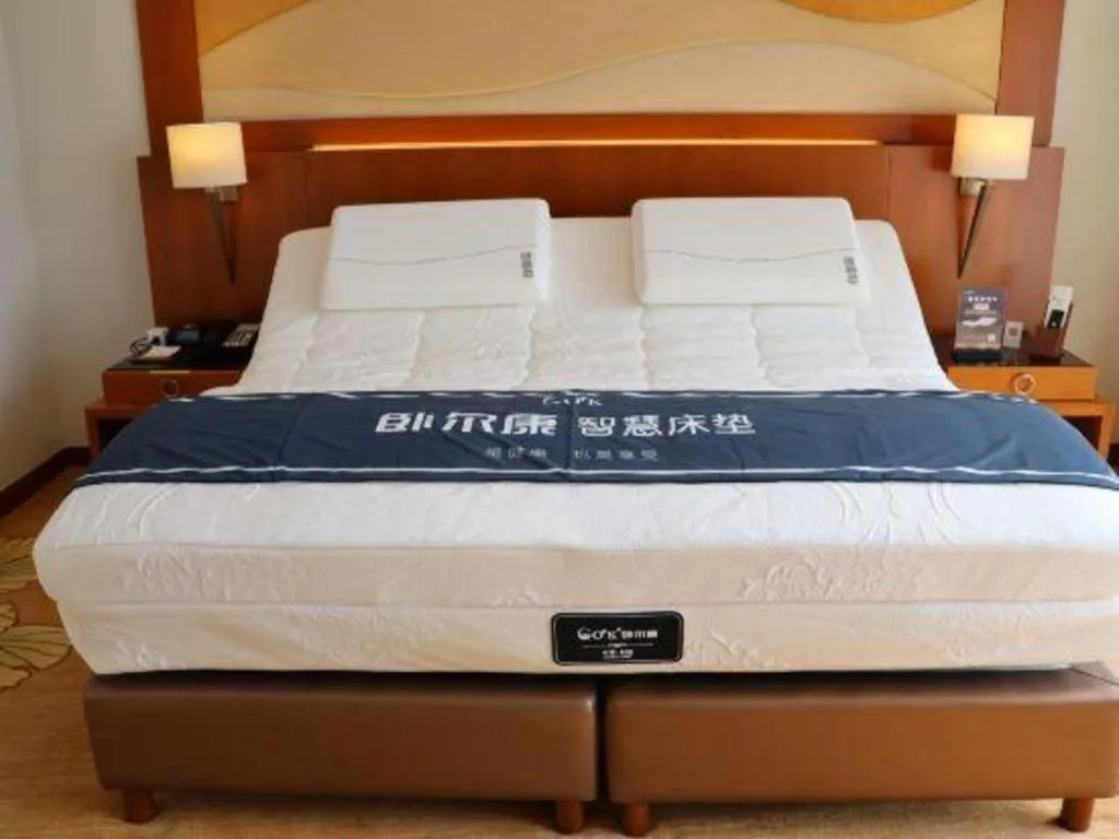 Bed in Jianguo Garden Hotel