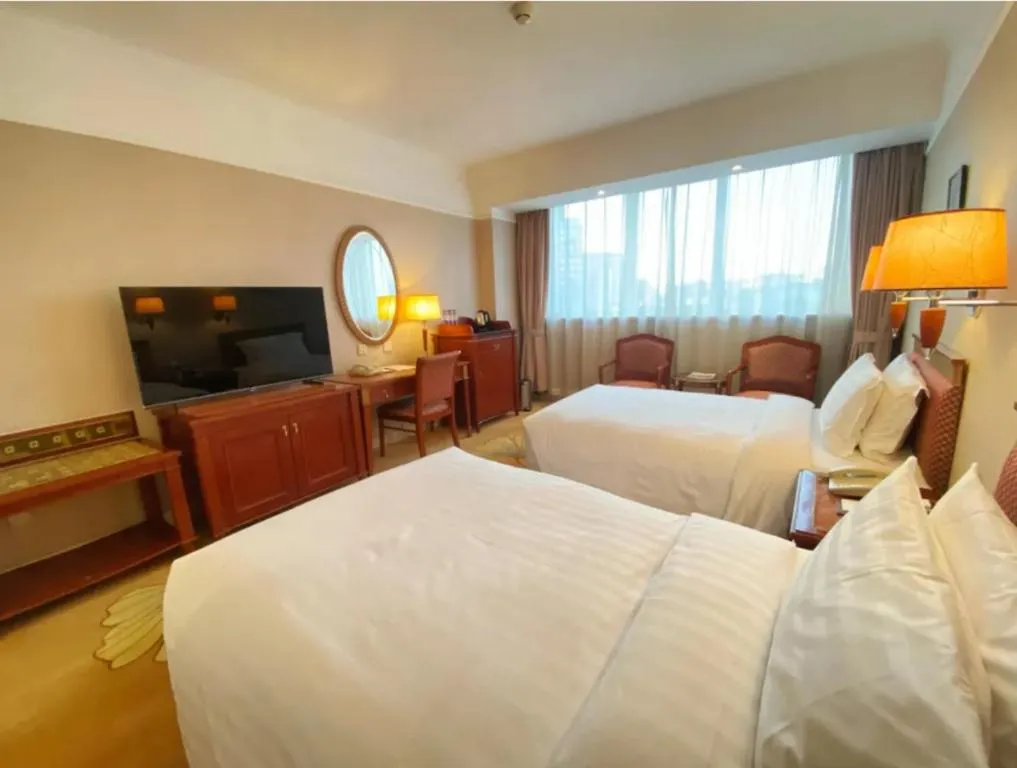 Bed in Jianguo Garden Hotel