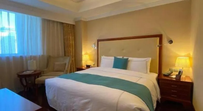 Bed in Jianguo Garden Hotel