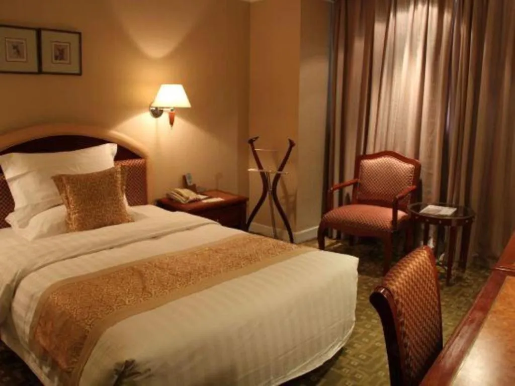 Bed in Jianguo Garden Hotel