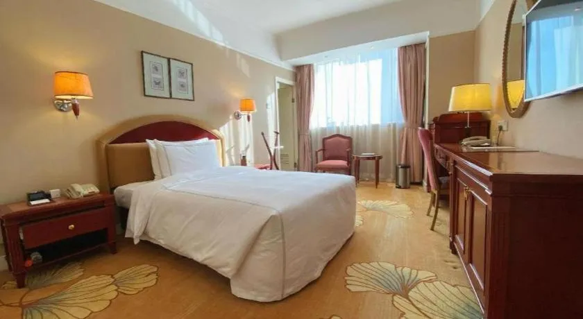 Bed in Jianguo Garden Hotel