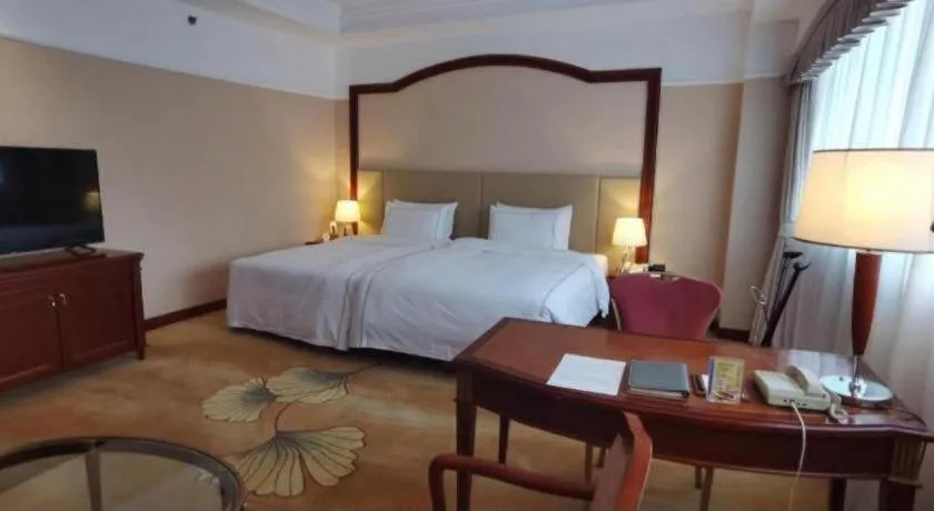 Bed in Jianguo Garden Hotel