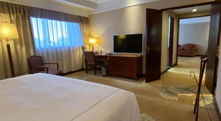 Bed in Jianguo Garden Hotel