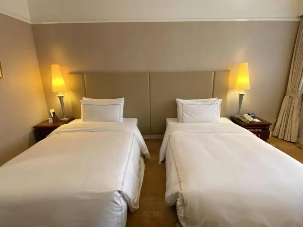 Bed in Jianguo Garden Hotel