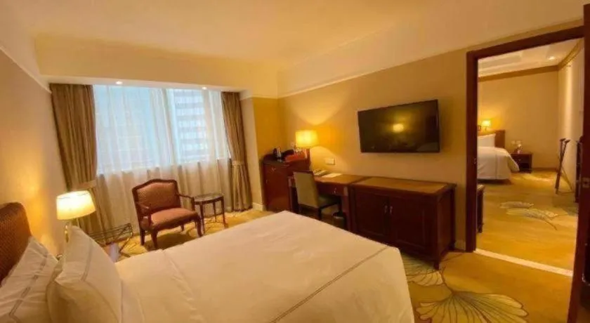 Bed in Jianguo Garden Hotel