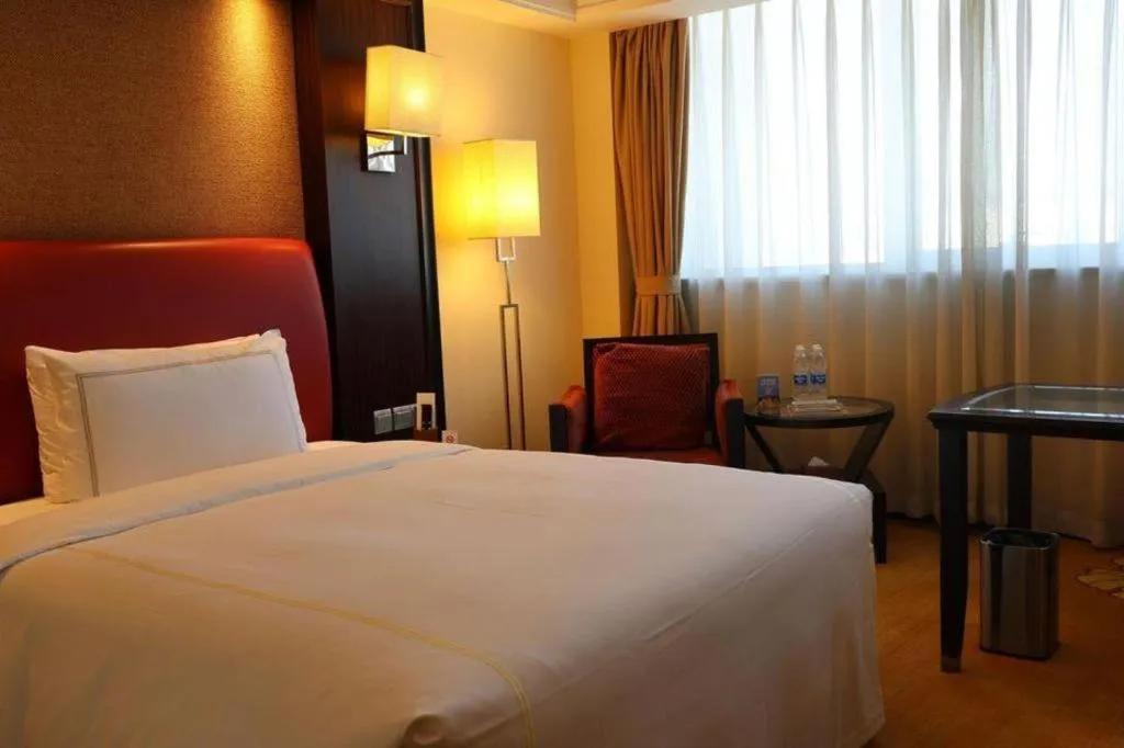 Bed in Jianguo Garden Hotel