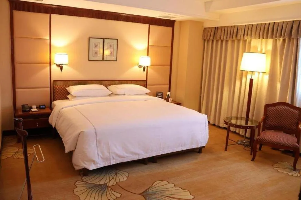Bed in Jianguo Garden Hotel