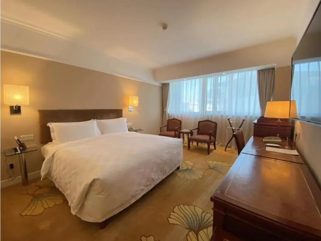 Bed in Jianguo Garden Hotel