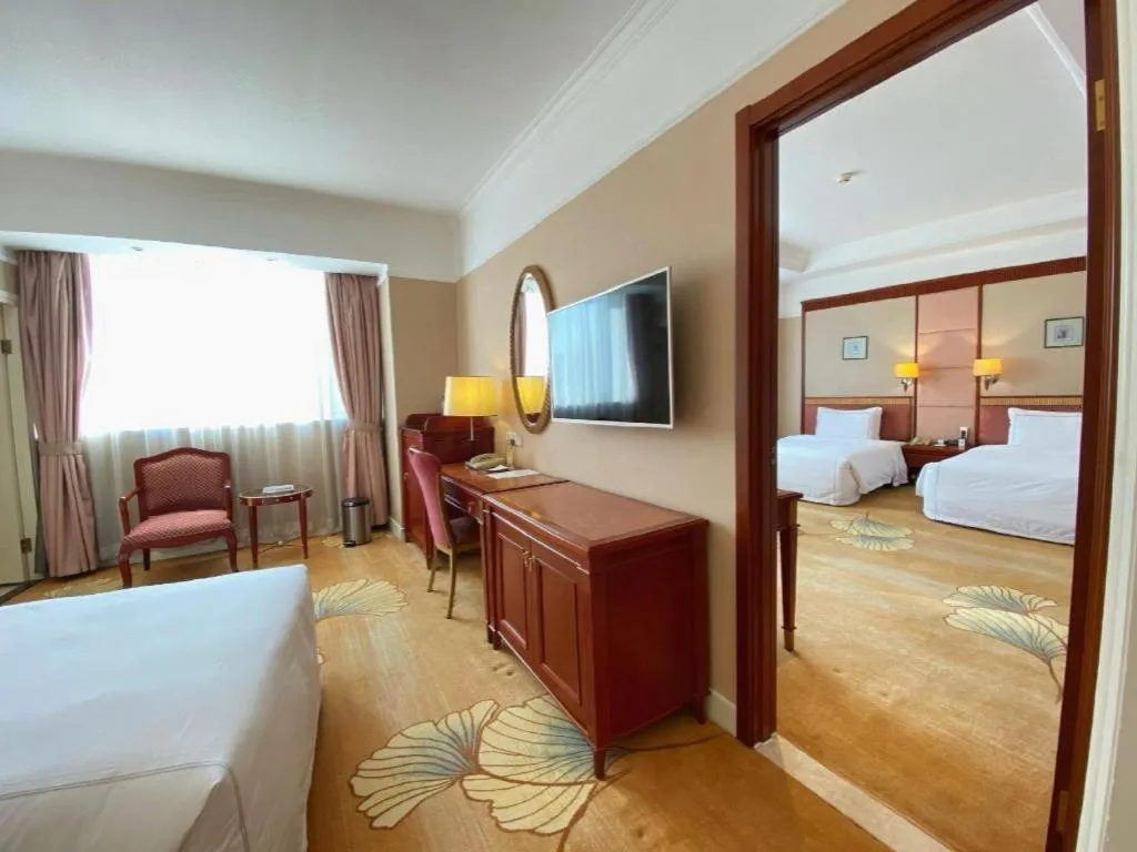 Bed in Jianguo Garden Hotel