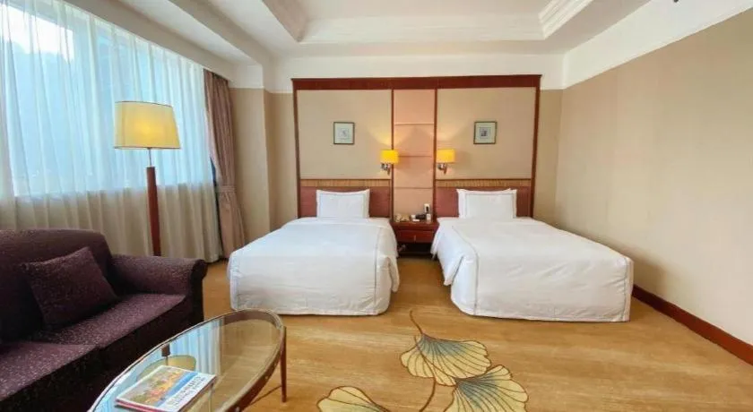 Bed in Jianguo Garden Hotel