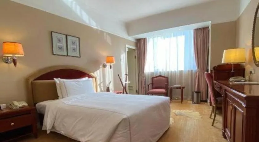Bed in Jianguo Garden Hotel