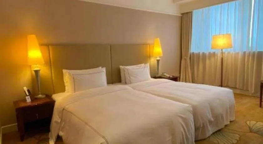 Bed in Jianguo Garden Hotel