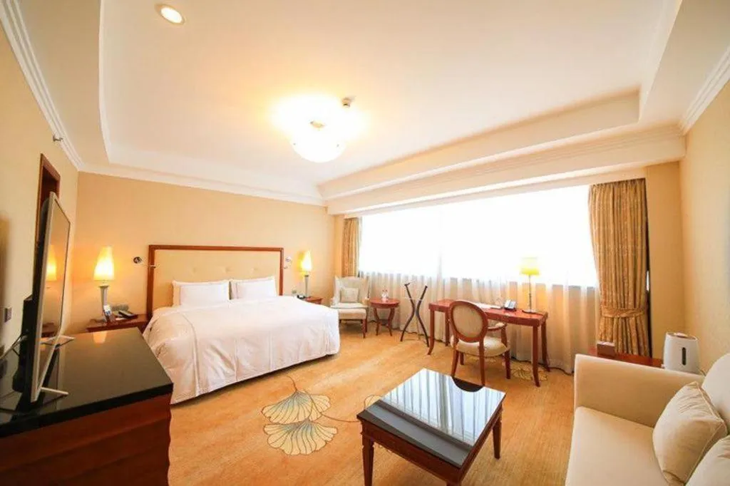 Bed in Jianguo Garden Hotel