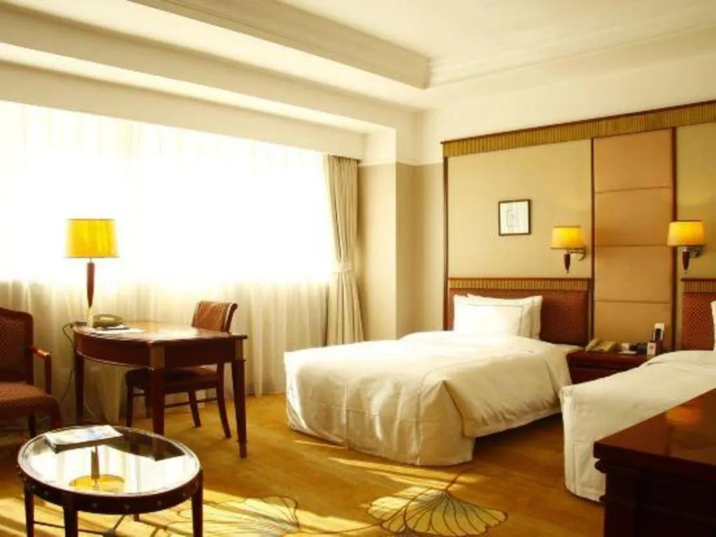 Bed in Jianguo Garden Hotel