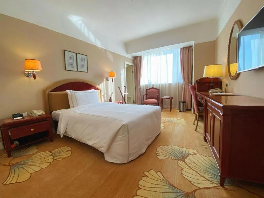 Bed in Jianguo Garden Hotel