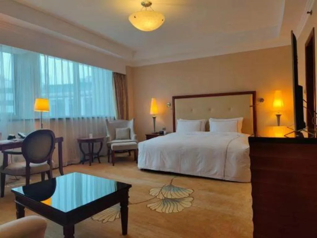 Bed in Jianguo Garden Hotel