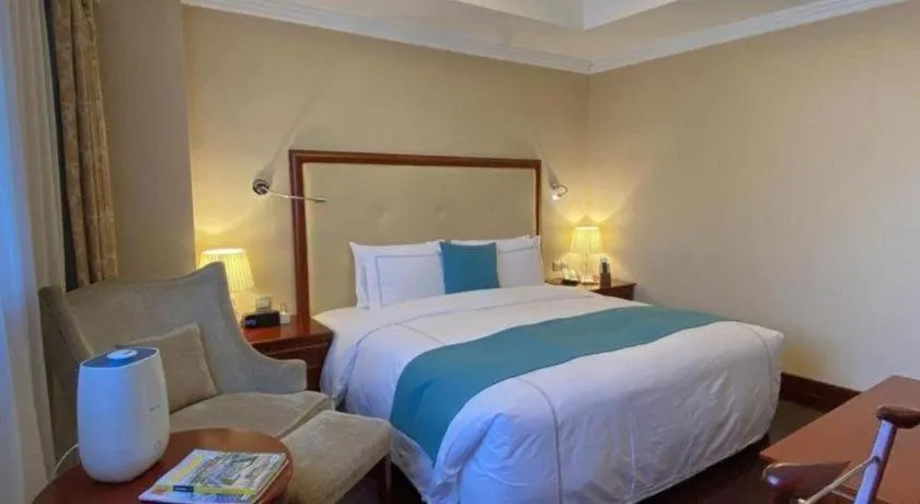 Bed in Jianguo Garden Hotel