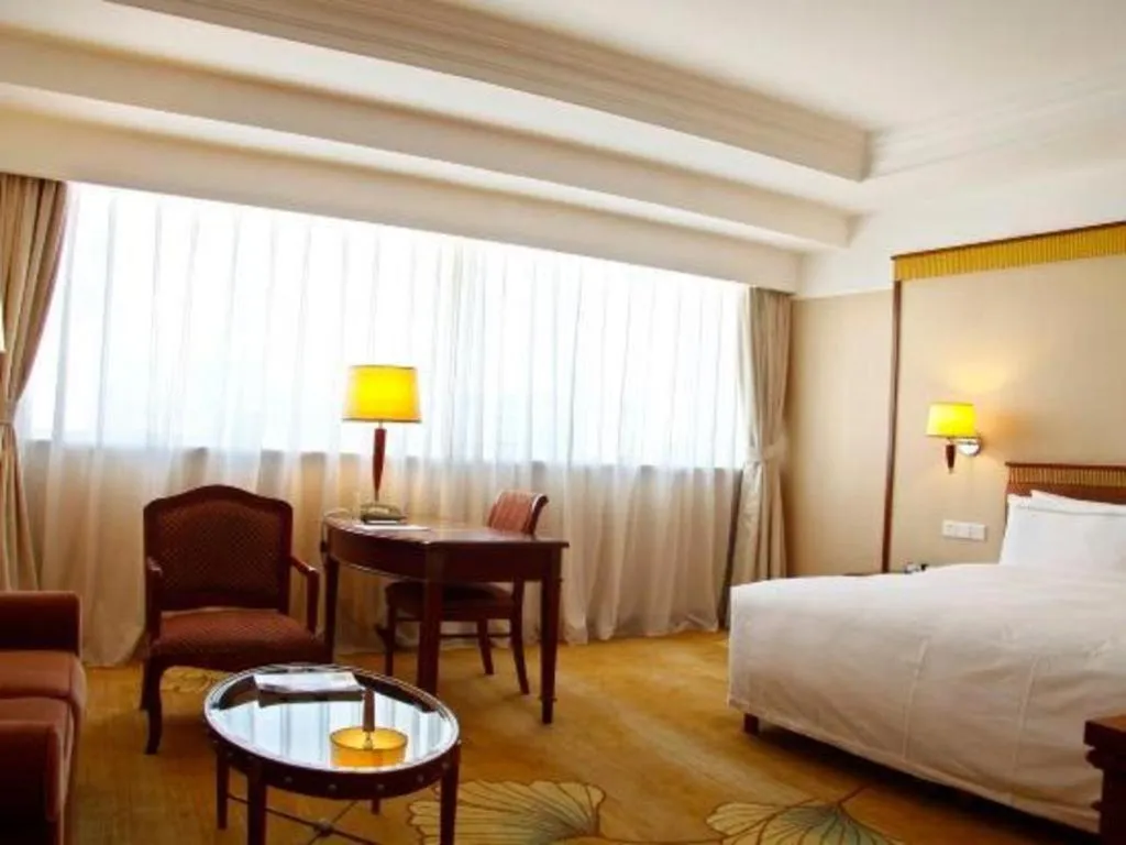 Bed in Jianguo Garden Hotel