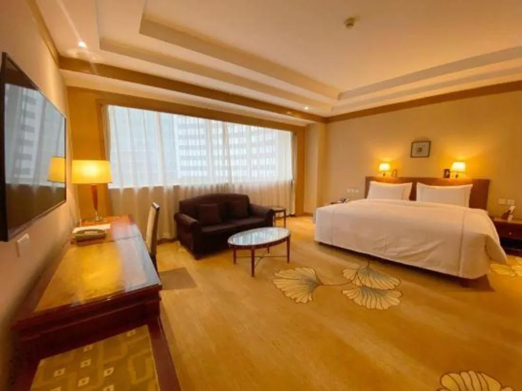 Bed in Jianguo Garden Hotel